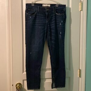 Dark wash Abercrombie jeans with zipper at ankle.